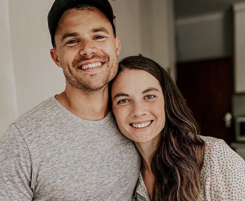 Juliet smiling with her partner